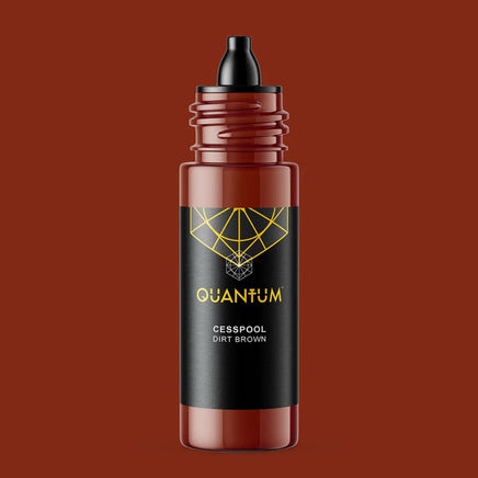 Quantum Tattoo Ink - Cesspool, featuring a translucent brown bottle with a black cap and a black label with gold geometric details and text, centered on a solid dark reddish-brown background.
