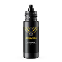 Quantum Tattoo Ink bottle with a gold geometric logo and the brand name a clean white background. The label also reads 'DEPRESSION' and 'CHARCOAL GRAY' color with a black dropper cap.