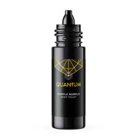 A black cylindrical bottle of Quantum Purple Nurple Deep Violet Tattoo ink with a black dropper spout, featuring a gold geometric logo and text on a white background.